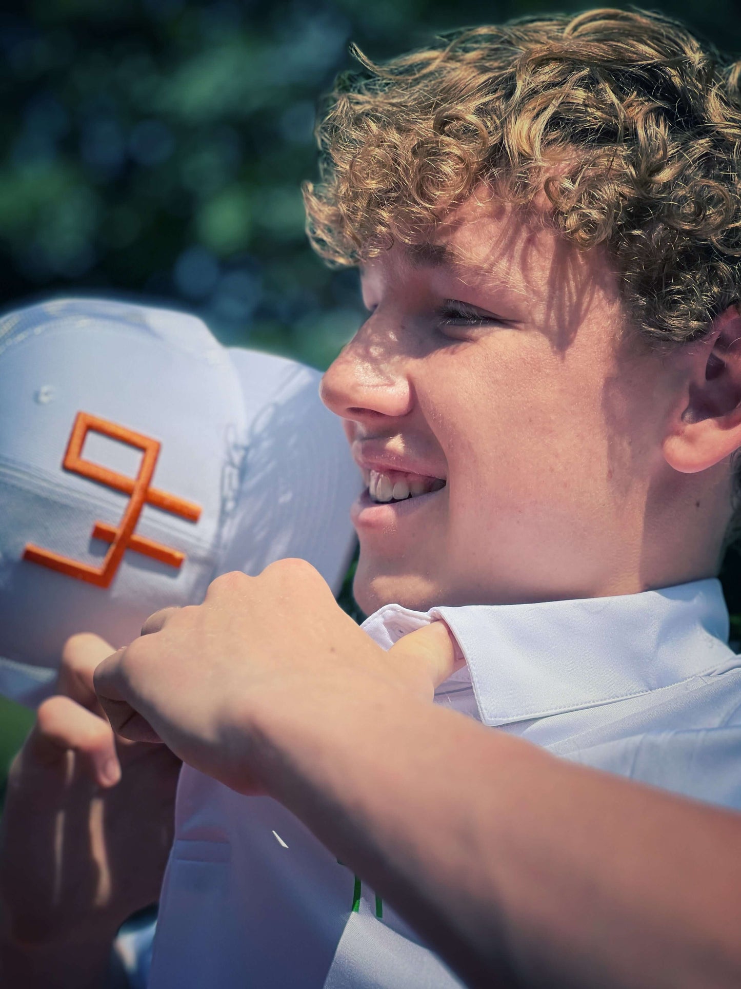 It's not a brand it's an attitude - Flat Brim white background Logo in 3D orange color