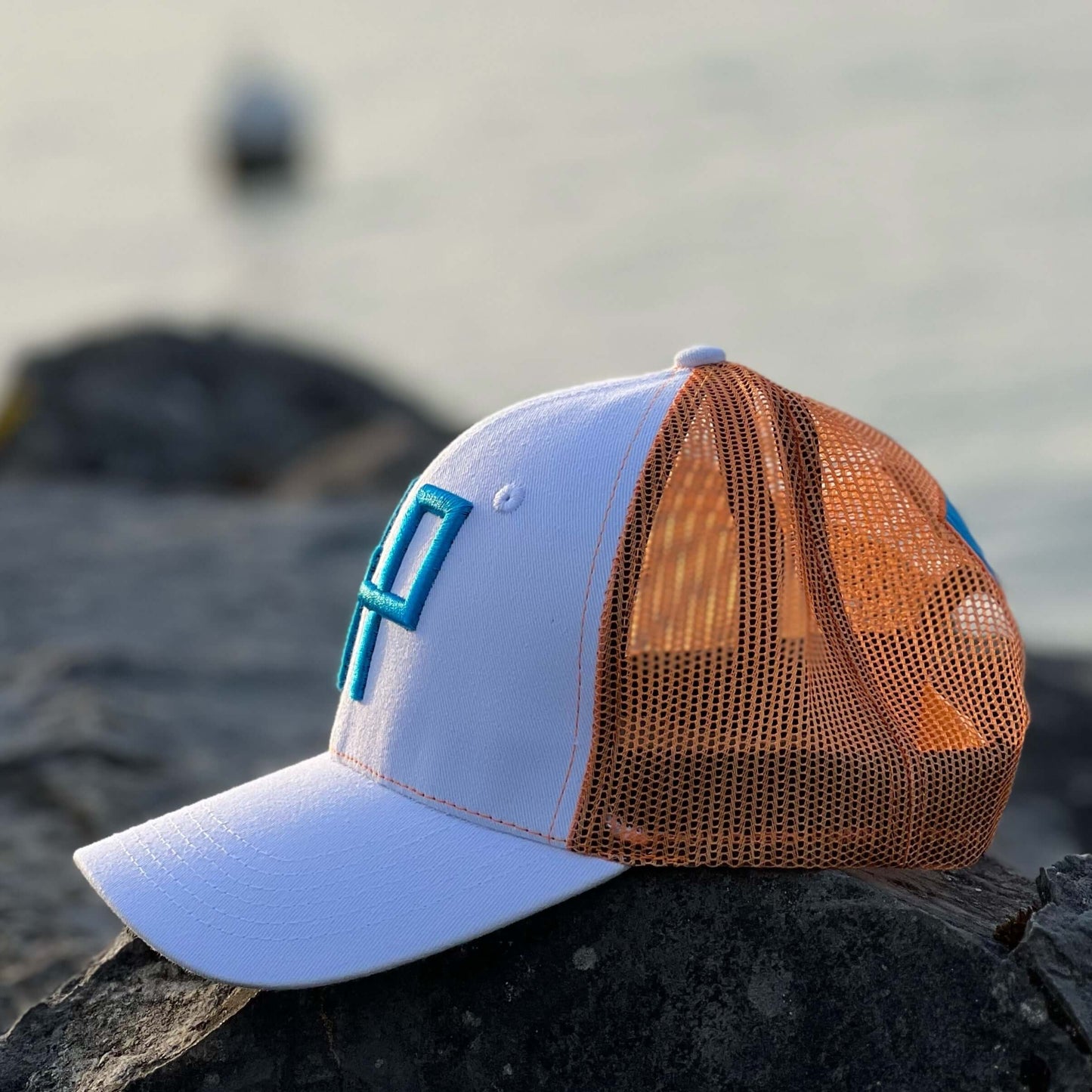 GENUINE SUMMER GOLF CAP - White front, blue embroidery and back label, orange mesh