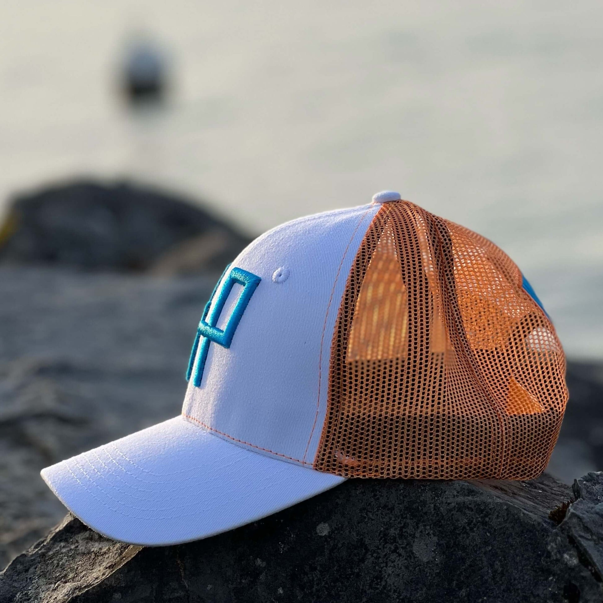 GENUINE SUMMER GOLF CAP - White front, blue embroidery and back label, orange mesh