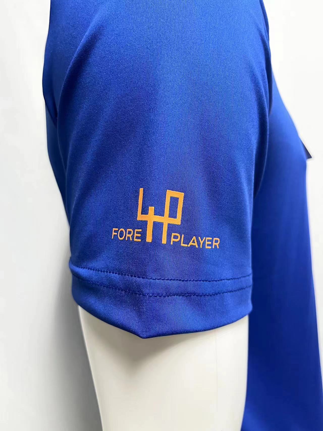 fashionable-blue-polo-side-view-logo-sleeve"