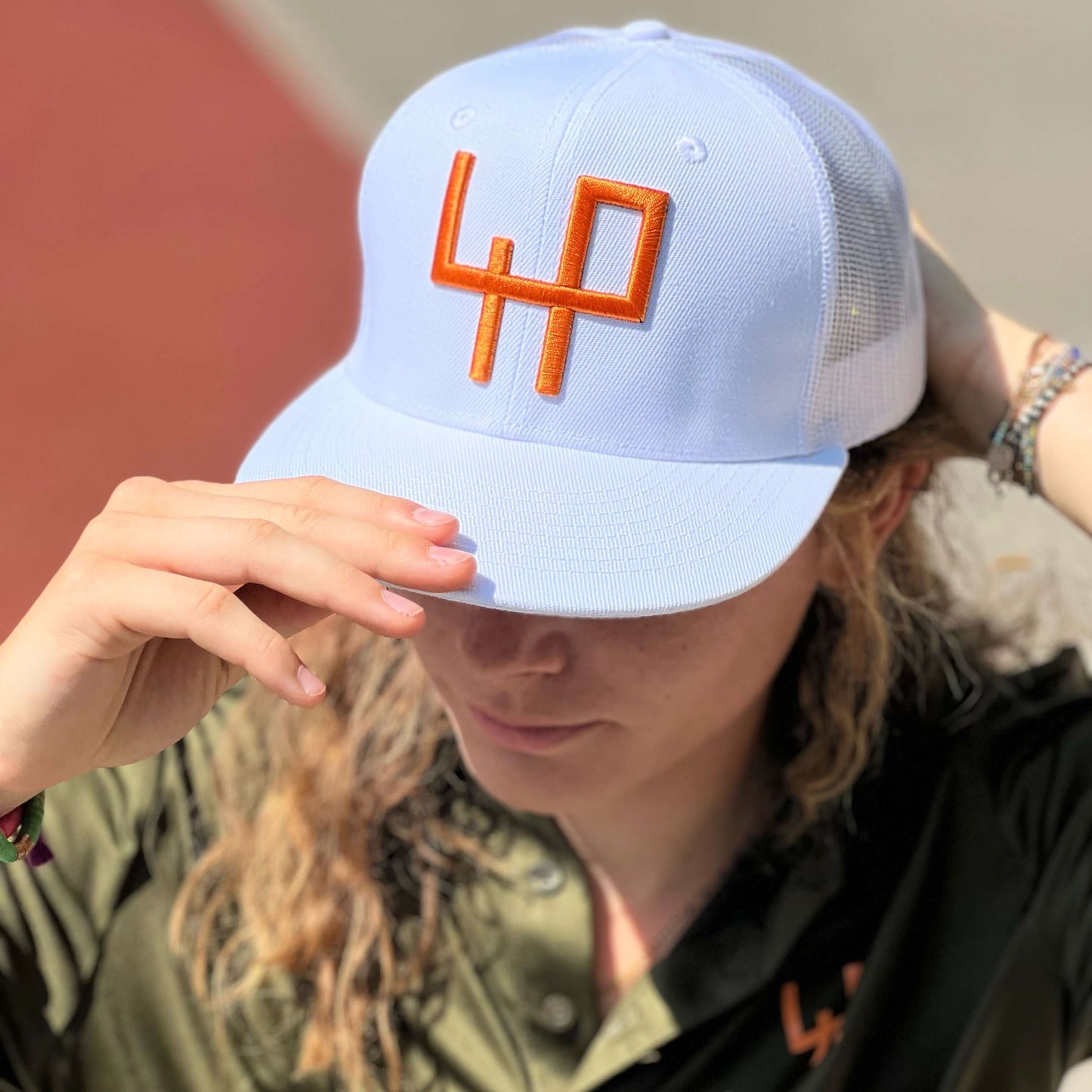 Flat Brim white background  Logo in 3D orange color - It's not a brand, it's an attitude!