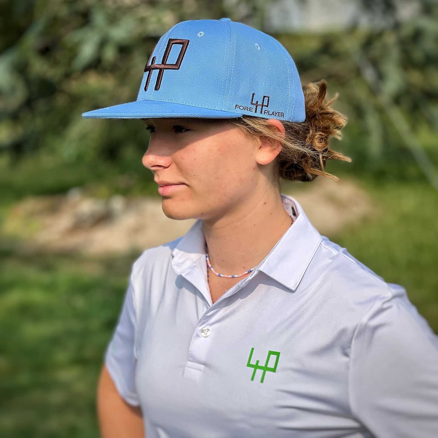 marie stylish outfit blue hat white polo