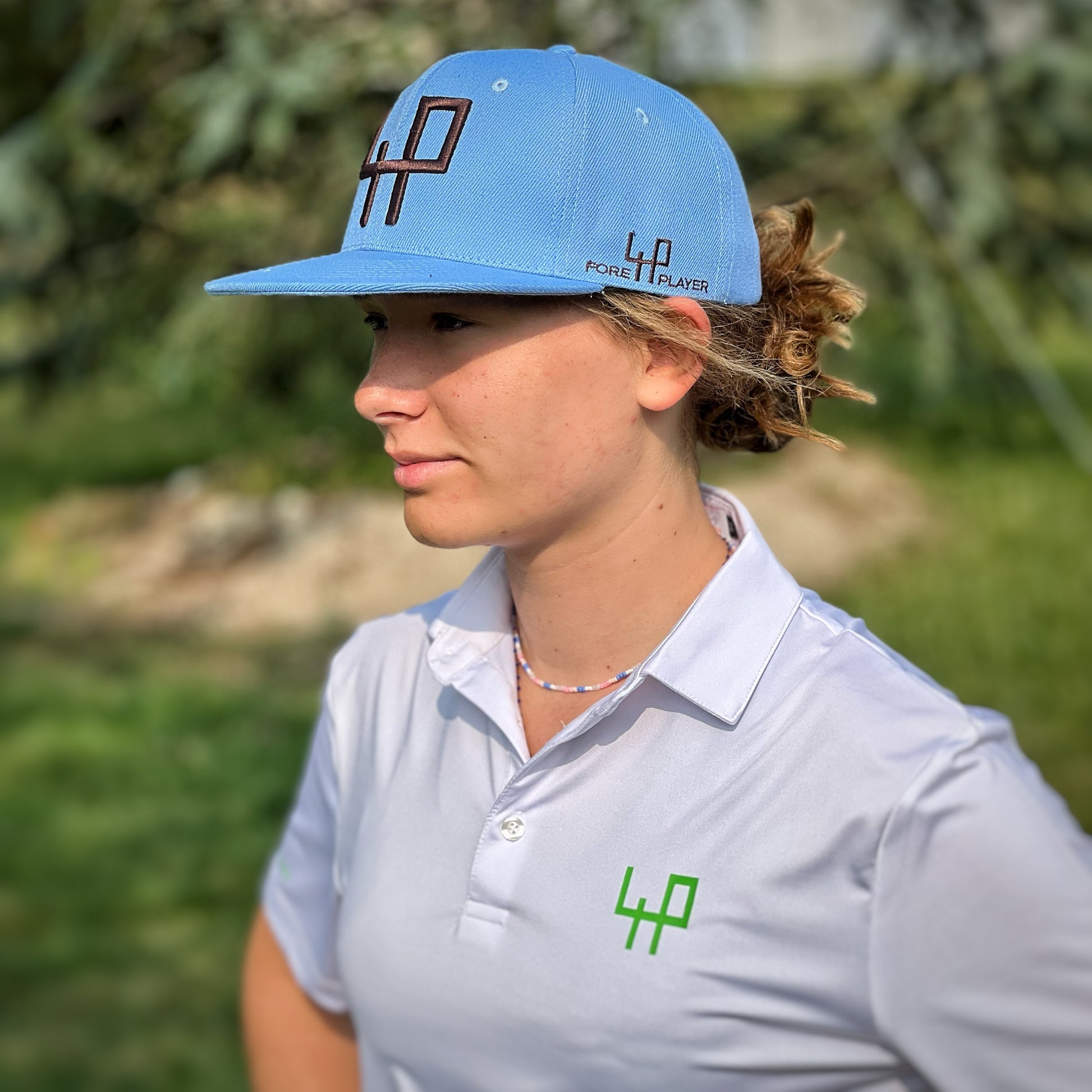 marie stylish outfit blue hat white polo