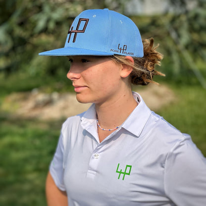 marie stylish outfit blue hat white polo