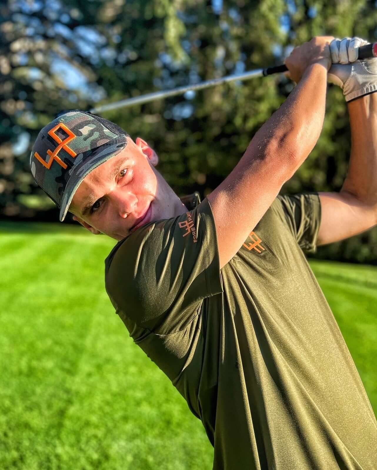 nathan-khaki-polo-camouflage-cap-golf-action